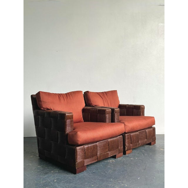 This exceptional pair of lounge chairs from the "Block Island" collection by the legendary Angelo Donghia represents the...