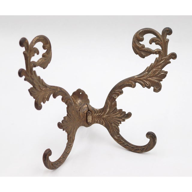 French style hall tree hook made of cast iron with brass plating. The original mounting nut is not included. Good...