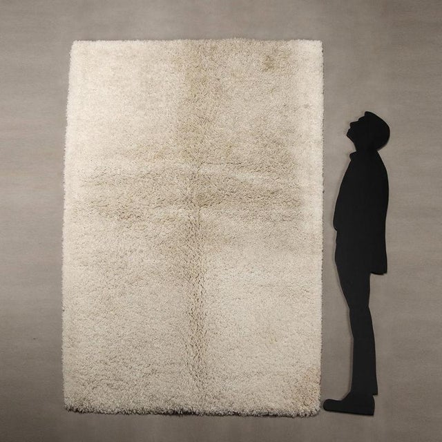 Vintage wool rug, large knot, hand-made. This piece is attributed to the mentioned designer/maker. It has no attribution...