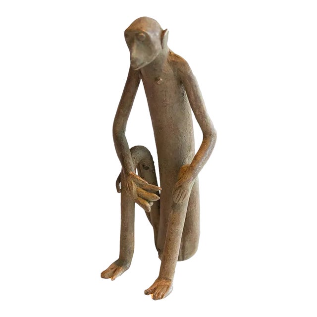 Vintage African Sitting Monkey With Banana Sculpture For Sale