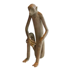 Vintage African Sitting Monkey With Banana Sculpture