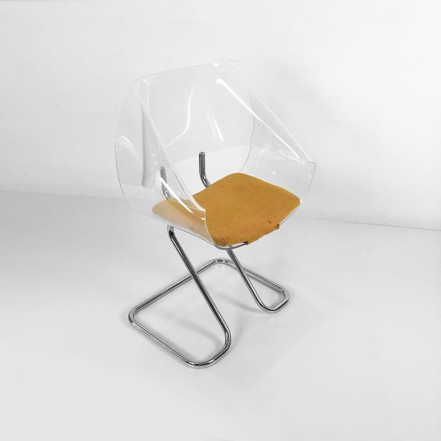 We offer this set of 4 chairs in acrylic and chromed tubular steel with amazing design, circa 1970.