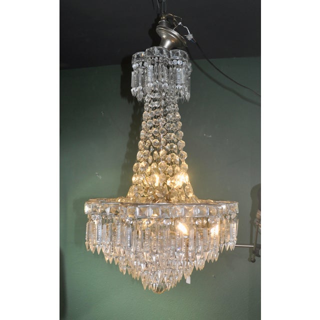 Vintage Crystal Chandelier, 1960s, in Good conditions. Designed 1960 to 1969 Up to 250V (Europe/UK Standard).The wiring of...