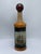 This is a handsome vintage Italian decorative bottle/decanter, crafted with a warm cognac-brown body and wrapped in deep...