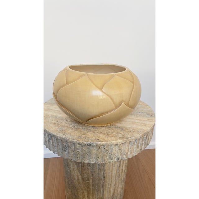 This large Royal Haeger planter features a lotus leaf or artichoke design, with overlapping leaves finished in a matte...