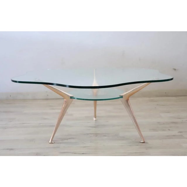 Rare and fine quality Italian design 1970s coffee table or sofa table by Bontempi. The table features lacquered steel...