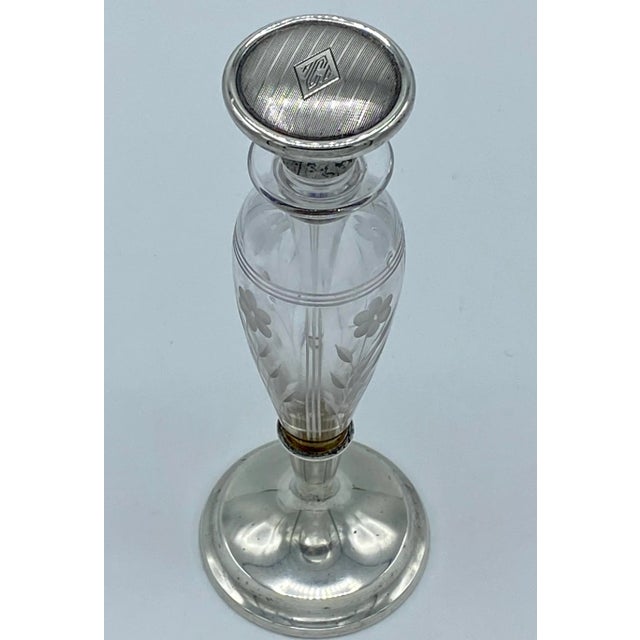 Beautiful Gorham Art Deco sterling silver and cut glass perfume/cologne bottle with stopper. The sterling silver lid is...