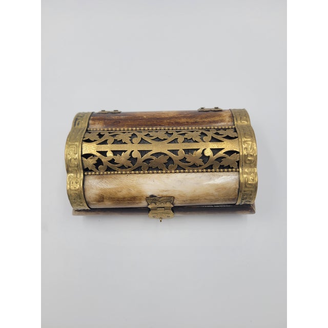 Elevate your vanity or bookshelf with this exquisitely handcrafted "Ship of the Desert" trinket box. Originating from...