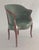 Antique Georgian tub back armchair with a continuous mahogany frame, upholstered in a dark green leather, a serpentine...
