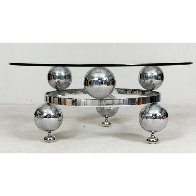 Space Age/Sputnik/Atomic Coffee Table, Germany, 1970s, construction made of six chrome-plated metal spheres, with a round...