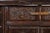 Chocolate Chinese Ming Dynasty Style Butterfly Cabinet with Carved Spandrels and Doors For Sale - Image 8 of 13