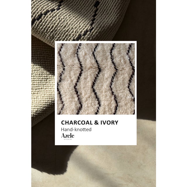 Crisp waves, drawn row after row. Fine charcoal chevron lines ripple horizontally across this piece in tight, even rows,...