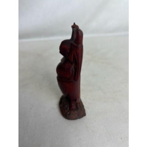 This Happy Buddha figure is very beautiful and auspicious. It is carved from gorgeous dark wood. Rubbing his belly is...