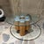 For your consideration, a designer cork coffee table, likely part of a contemporary collection that experiments with...