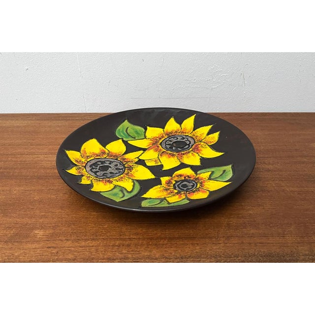 Mid-Century German Studio Pottery Wall Plate with Sunflower Design from Ruscha, 1960s, in Very Good conditions. Designed...