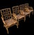 This Vintage Set of Milling Road by Baker Furniture Bamboo and Cane-Bottom Armchairs is a warm and sophisticated seating...