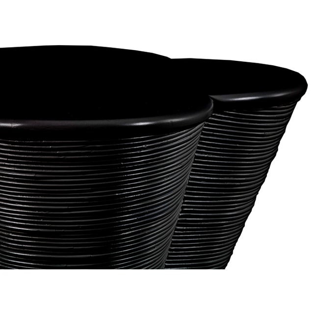 Inspired by the classic Quatrefoil form common in the Renaissance period, this beautifully unique side table features a...