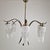 Striking and elegant Italian pendant lamp attributed to Mazzega, executed in Murano glass and brass during the 1970s. The...