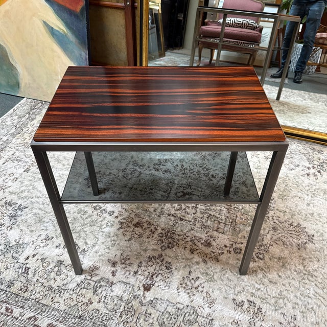 Design Plus Gallery presents a Side Table of Macassar Ebony with Smoked Glass. The tabletop is has a naturally occurring...