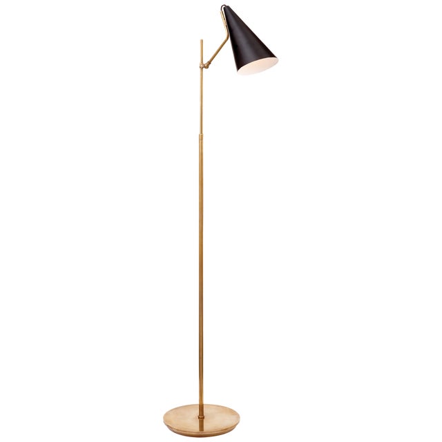 Clemente Floor Lamp in Hand-Rubbed Antique Brass with Black Designer: AERIN Height: 47.25" - 59.25" Shade Detail: Black...