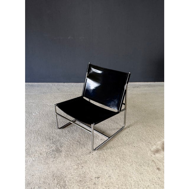 Vintage Midcentury Modern Minimalist Design Leather Low Lounge Chair. Made in France, 1970's period. Chrome steel tubular...