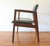 This is a mid century modern arm chair by United Chair Company. It has a solid wood frame with an upholstered contoured...