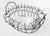 Made in France during the early to mid 1900s, this bread basket features a durable hand-wrapped frame with swing handles....