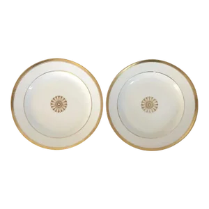 Early 19th Century French Empire Porcelain Round Platters Decorated with Gold Flower Head - A Pair