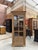This antique display cabinet made of unfinished solid oak has been fully restored. It features a large glass door that...