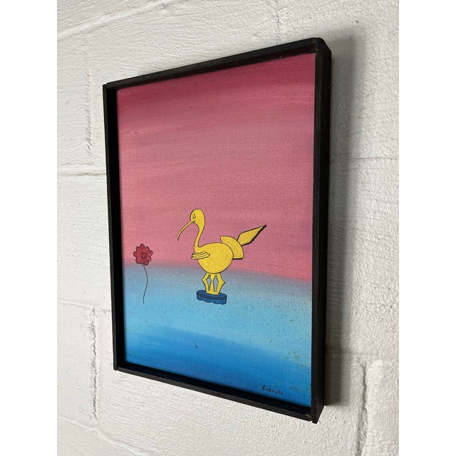 A charming mid-century modern painting on canvas signed Segreto, featuring a stylized yellow bird rendered in a playful,...