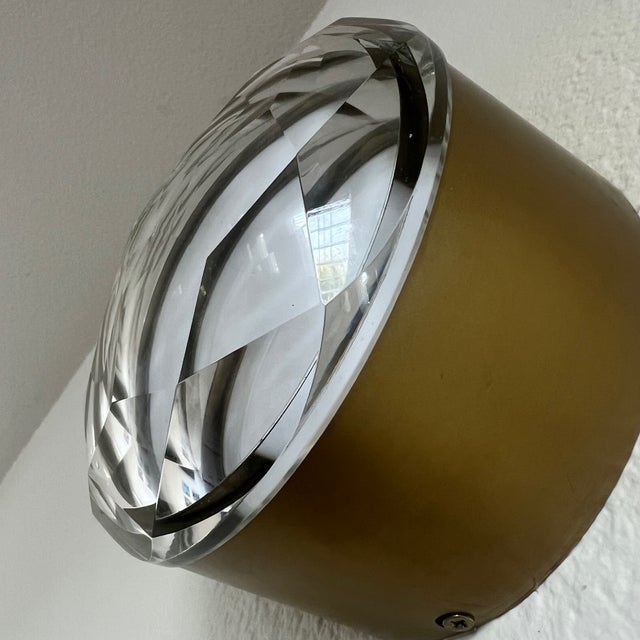 A truly unique lighting fixture: the Arteriors Home Estelle Wall Sconce. This exceptional piece features a thick clear...