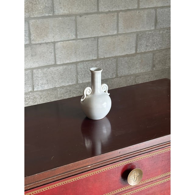 Very nice form and color with matte white glaze. From is a blend of modernist and Swedish grace, allowing for use in a...