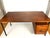 Teak desk by Herbert Hirche for Holzäpfel / Germany, 1950s, with 3 drawers and a pen pullout below the top. The wooden...
