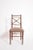 Faux bamboo chair, 1960s. Faux bamboo natural wood chair, with cross-braced back, the 4 legs connected by spacers. France,...