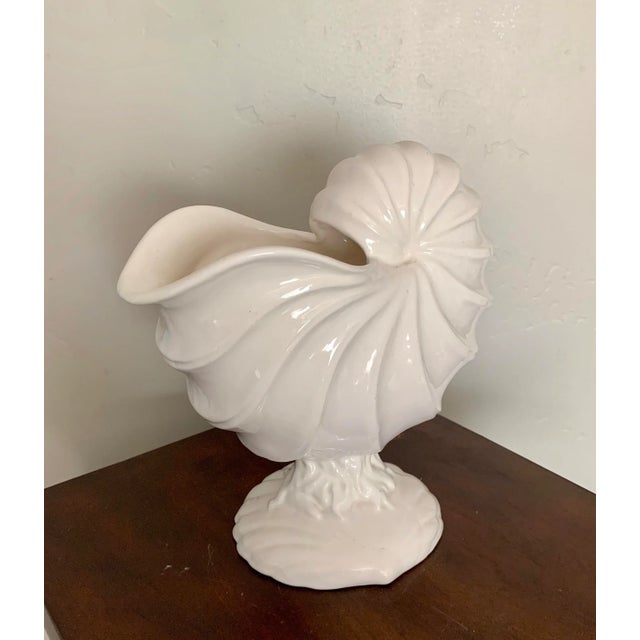 Beautiful 10" footed Shell shaped cream color ceramic bowl Perfect for a Coastal themed house to hold flowers or on its...