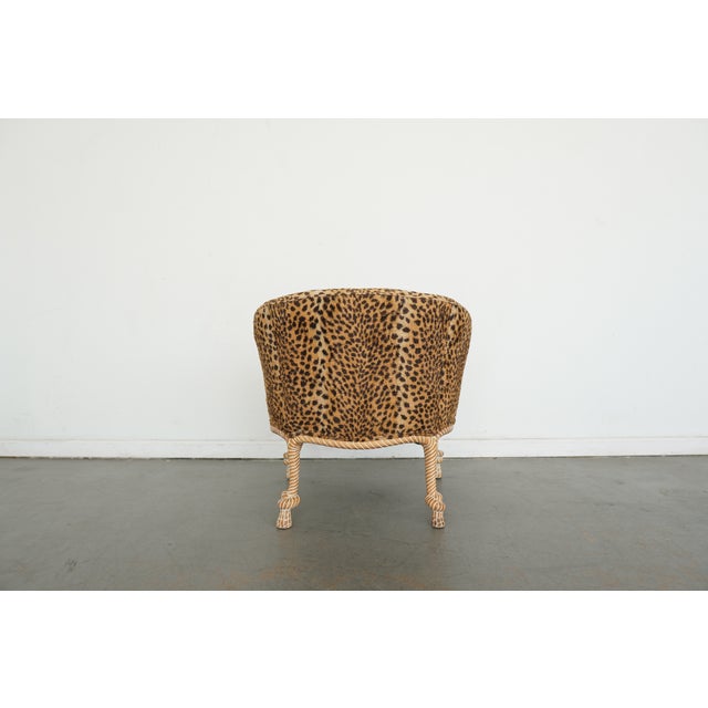This accent chair is crafted in the dramatic Napoleon III style, interpreted through a sculptural rope-carved frame that...