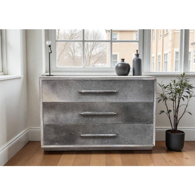 Bernhardt Parkin Hair on Hide Chest of Drawers. Wrapped in gray hair-on-hide with saddle stitching and polished stainless...