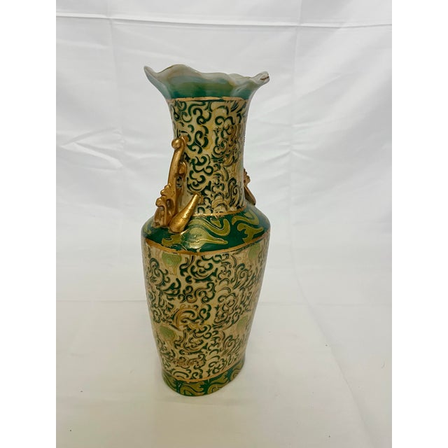 Add a dose of statement-making elegance to your collection with this stunning vintage chinoiserie vase. Featuring...