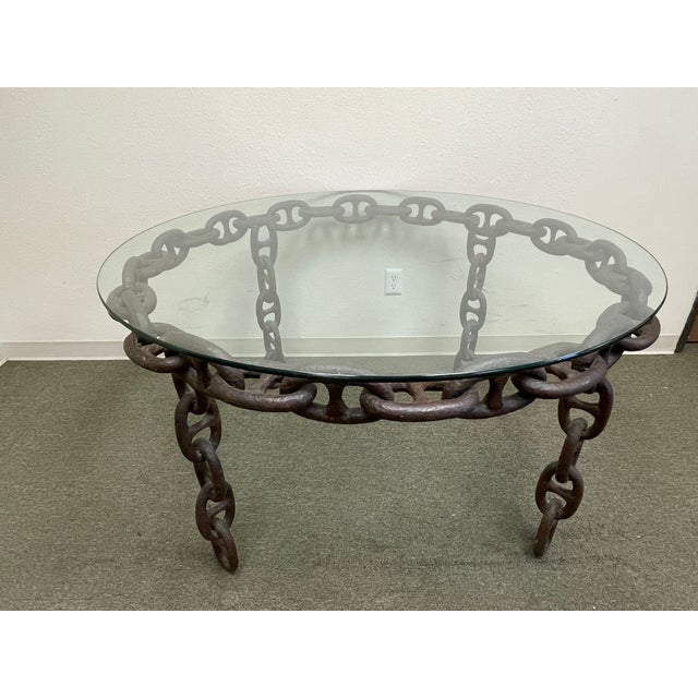 Rare and striking vintage 1970s chain-link coffee table with a bold Brutalist-inspired design. The substantial...