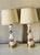 Antique Victorian labels pair of milk glass lamps with Handpainted red roses , on reticulated brass bases. .