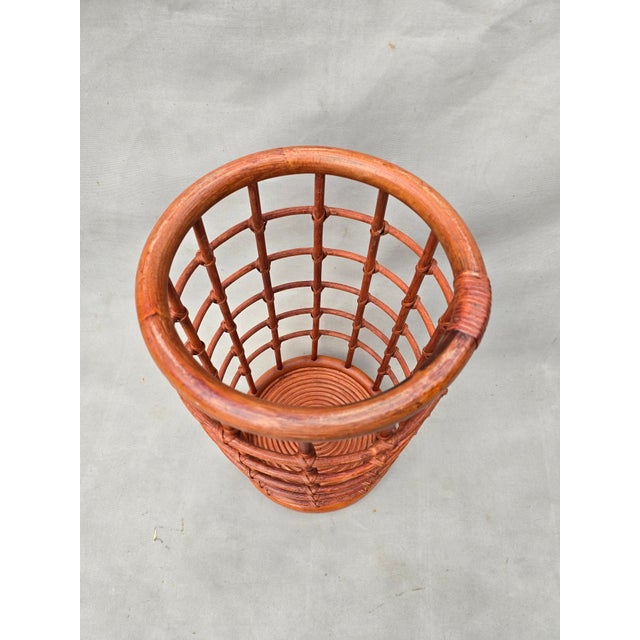 This is a unique rare red colored bamboo umbrella stand by Franco Albini. This would be great in any room, especially a...