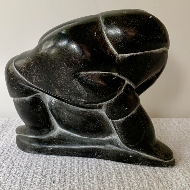 Inuit Soapstone Carving by Lucassie Amm – Signed - Kneeling Inuk Figure For Sale - Image 10 of 18