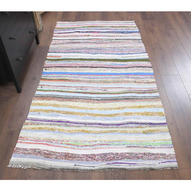 Vintage Turkish Hand-Knotted vintage rug is a semi-antique vintage kilim runner rug.'70s Eastern region of Turkey's unique...