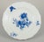 Meissen, Germany. Four dinner plates in porcelain. Hand-painted with floral motifs and insects in blue. Approximately...