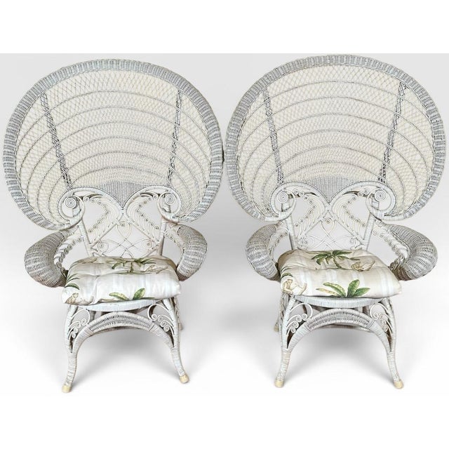 Vintage Boho Chic White Wicker Peacock Fan Back Chairs With Custom Cushions Pair This spectacular pair of vintage...