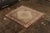 Hand knotted in wool originating from China circa 1920, this antique rug connotes a Peking Art Deco design in a rich...