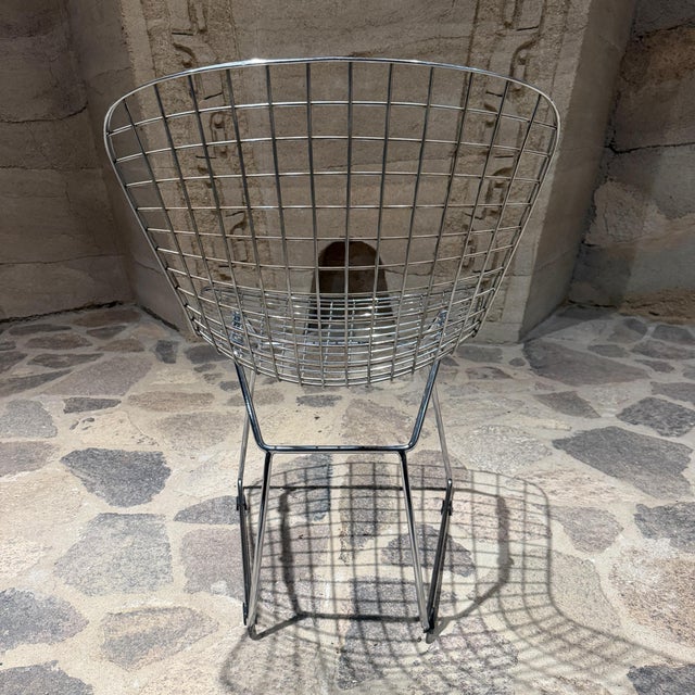 For your consideration a set of four (4) Harry Bertoia Wire Side Chair (Model 420), originally designed in 1952 for Knoll...