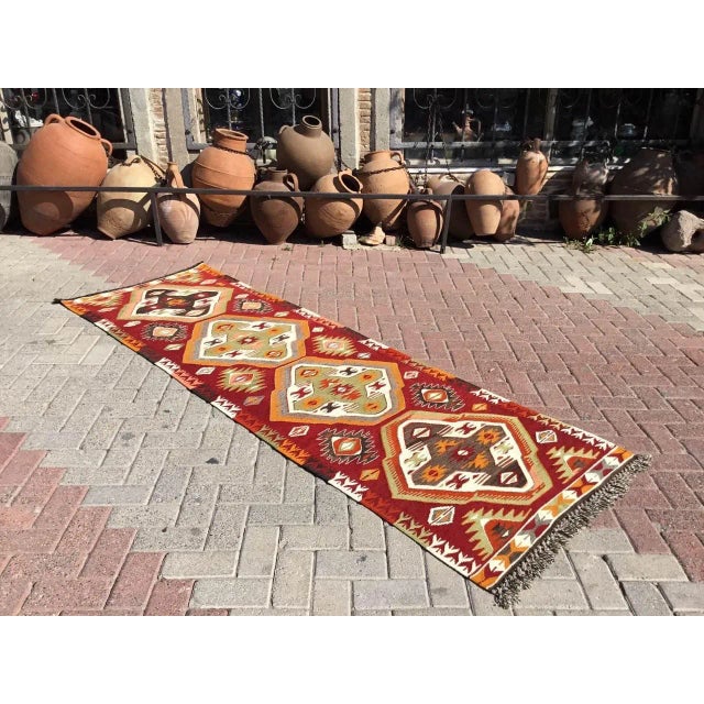 This beautiful, vintage, handwoven kilim is approximately 50 years old. It is handmade, of very fine quality hand spun...