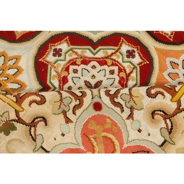 A stunning example of 19th-century French textile artistry, this antique needlepoint carpet from the 1880s beautifully...