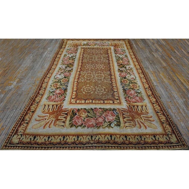 Antique Allover Floral Wool Hand Knotted Pile Brown Earth Tone 1750s Rug, Circa Date: 1750s. This extraordinary piece...
